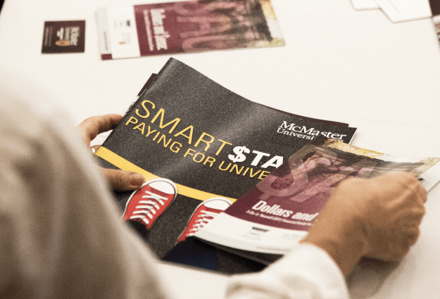 Image of arms holding pamphlet for Smart Start.