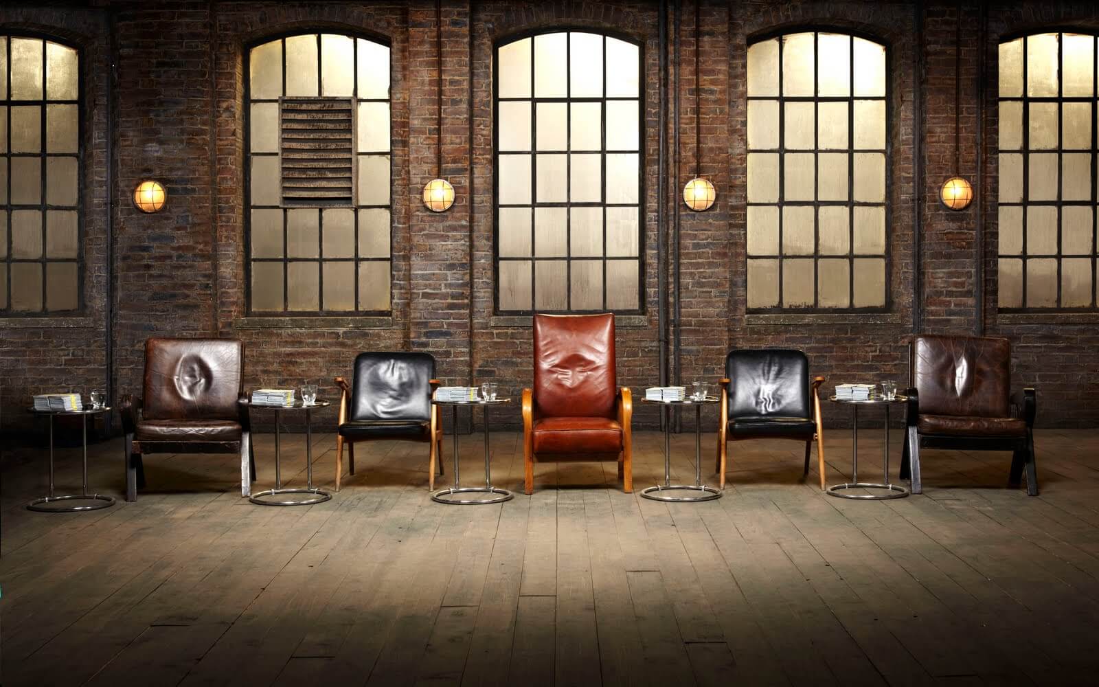 Image of five empty chairs, simulating the Dragon